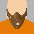 icomania:Man with brown leather mask on over his face.