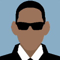 icomania:A black man with sunglasses and white collar.