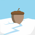 icomania:An acorn on the snow, cracked ice.