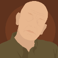 icomania:A bald person with a green shirt on