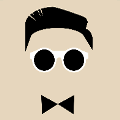 icomania:Man with white sunglasses and bow tie.